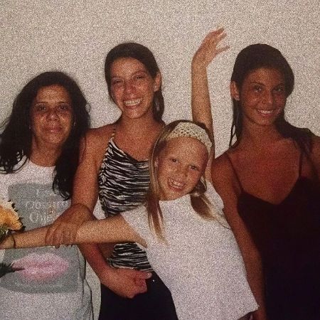 Mia Goth and her family were photographed when she was a teen. 